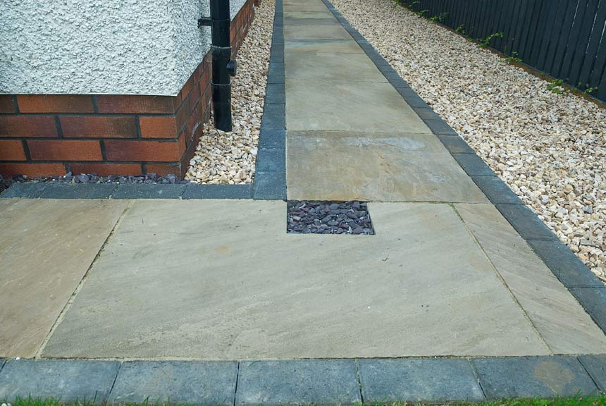 image of grey Indian sandstone with gravel.
